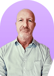 Headshot of a man against a purple background
