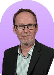 Headshot of a man in a suit against a purple background
