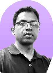 Headshot of a man wearing glasses against a purple background.
